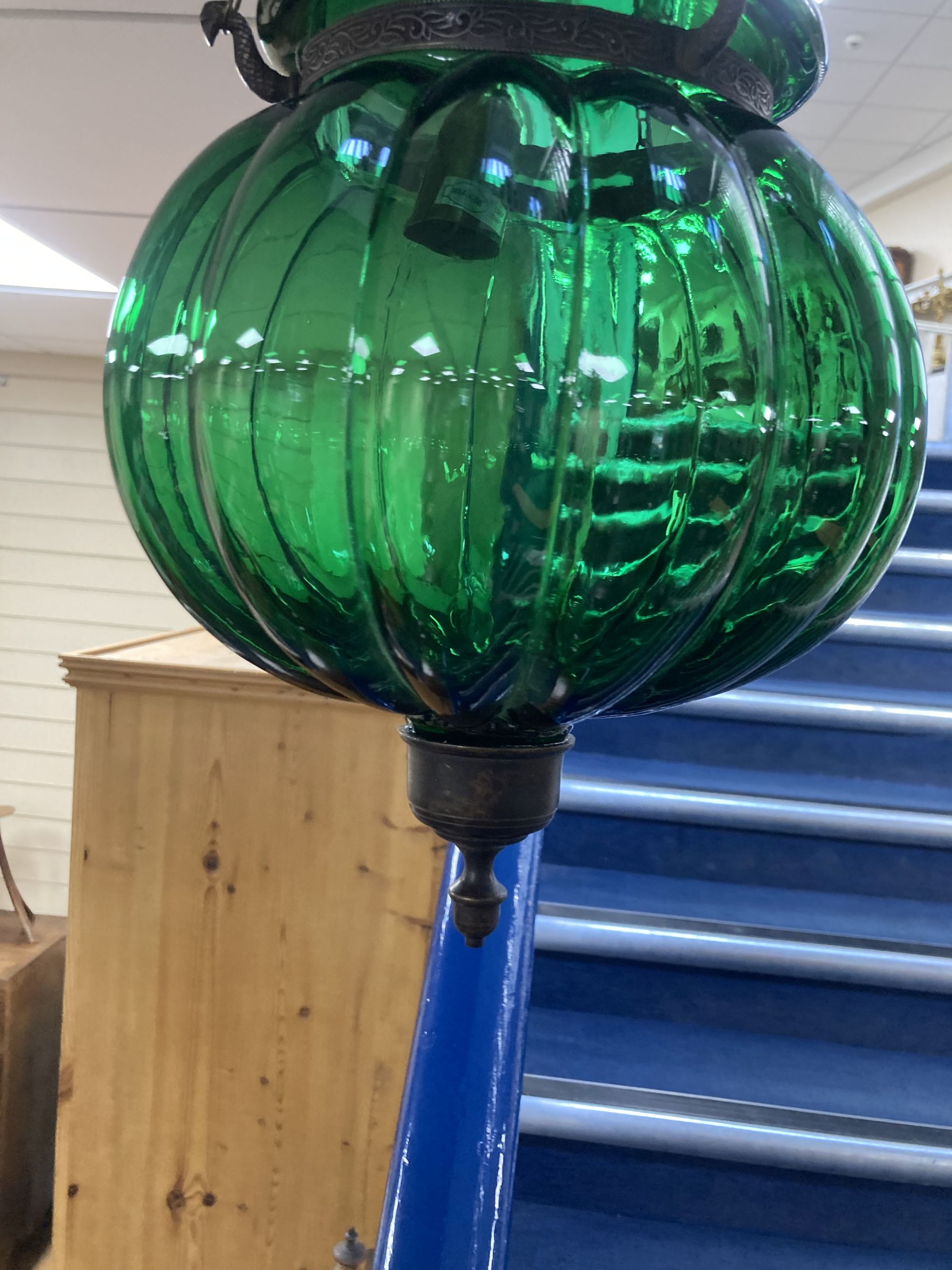 A ribbed green glass ceiling shade, height 50cm